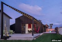 Glass and Metal Addition Modernizes 1920s Phoenix Bungalow