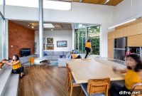 Angular Design and Lush Greenery Shape the House Among Trees