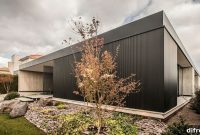 Contemporary LL House in Argentina with Sleek Black Exterior