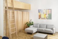 Historic Budapest Apartment Reimagined in Wood and White