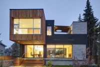 Adaptable Canadian Riverfront Home with Two-Story Courtyard