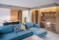 Watch This Custom Wooden Rack Transform a Tiny Spanish Apartment