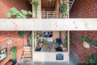 Amsterdam Terracotta House with Wood and Perforated Metal