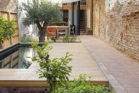 Textured Extension Adds Charm to Spanish Family Home
