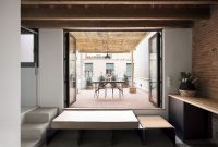 Ingenious Attic Apartment Becomes a Conversation Pit