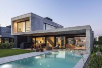 Inside a Concrete and Glass Home in Buenos Aires for a Young Couple