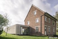 Sunken Modern Extension Transforms Brick House in the Fields