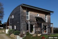 Bioclimatic Wood and Concrete Home for Sustainable Living