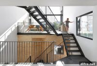 Durable Dutch Loft Elevates Prefab Frame with Striking Interior