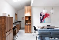 Custom Carpentry Transforms Family Home with Green Landscape