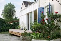 Elevated Wooden Deck Expands Modest 1960s Parisian Home