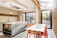 Victorian Home Addition: Oak, Concrete, Exposed Brick and Glass