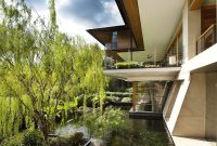 Singapore Family Home with Roof Gardens and Sloping Terraces