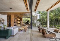 Brazilian L-Shaped Home with Green Roof and Courtyard