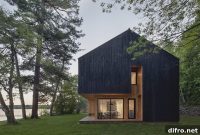 Active Lakeside Cabin in Canada with Sleek Dark Exterior