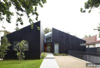 Cedar House: Dark Facade, Warm Minimal Interiors