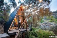 A-Frame Treehouse in the Woods Built from Recycled Materials