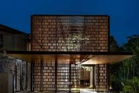 Timber Screen and Greenery Envelop a Singapore Home