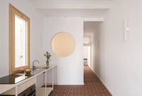 Barcelona Apartment Transformed with Open Plan and Round Windows