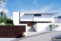 Two Modern Homes Behind One Shared Facade