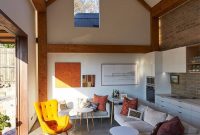 Sustainable Vacation Home with Green Roof and Insulated Design