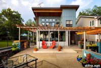 Three-Season Metal and Wood Room Transforms Waterfront Home