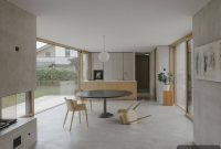 Inside a Minimalist Concrete and Wood Home on the Forest Edge