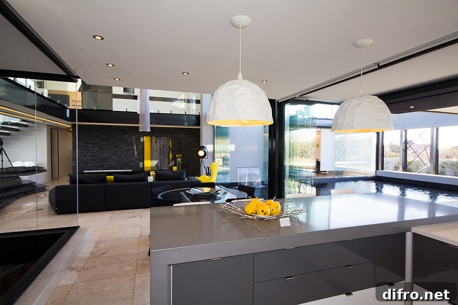Elegant ROCK pendant lights above the kitchen island