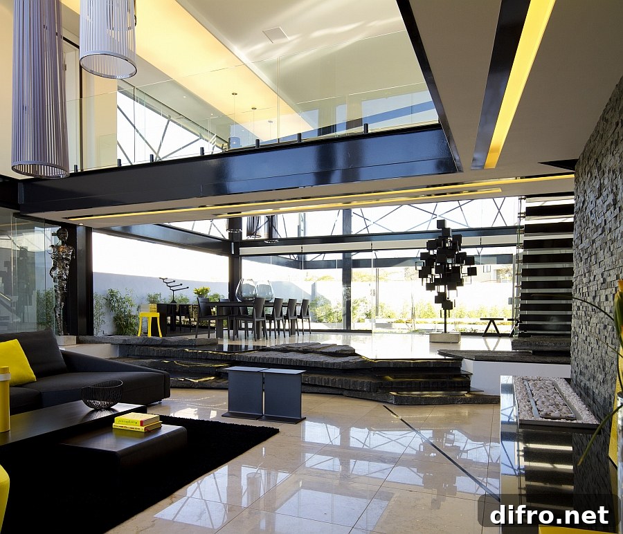 Expansive living space of House BER with a double height ceiling