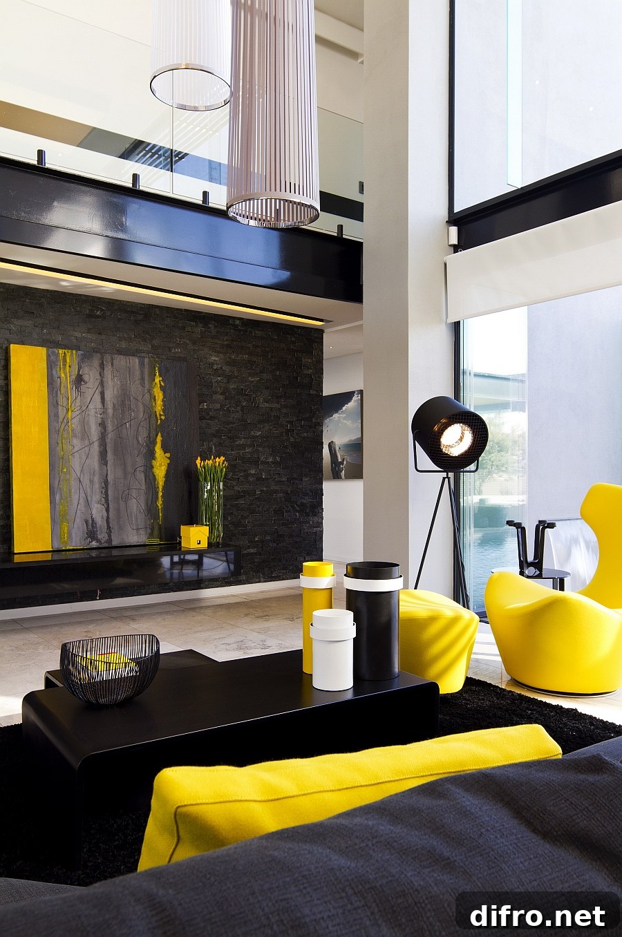 Bright yellow accents enliven the contemporary living room with dark hues