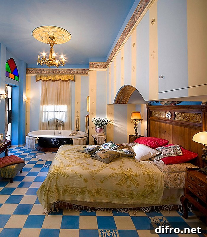 Luxurious and colorful Moroccan bedroom with a clawfoot bathtub in the corner