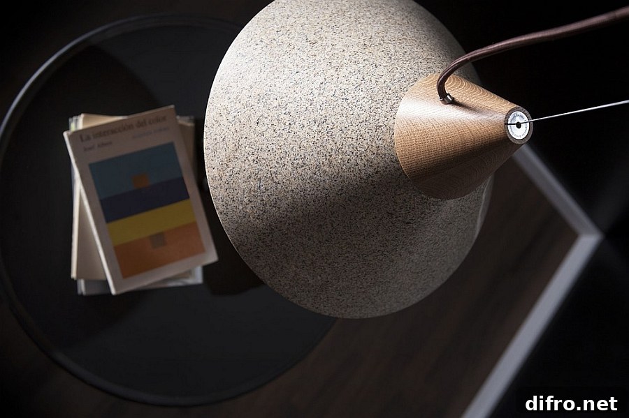 A wooden top adds visual and textural contrast to the pendant