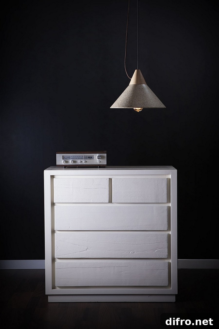 Wood meets granite in the design of the elegant Mika 350 pendant