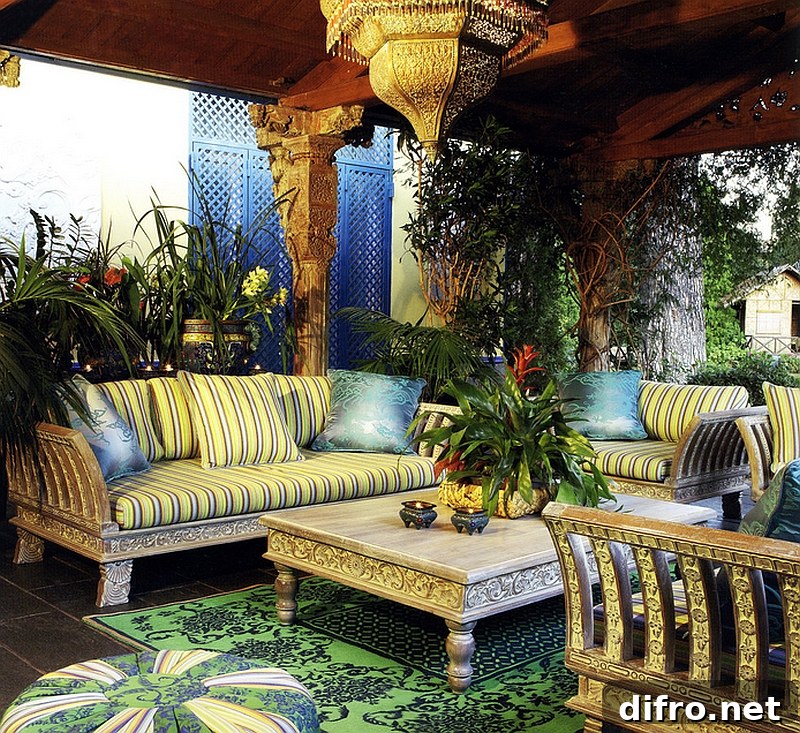 Intricately carved decor and brilliant lighting shape this stunning Moroccan patio