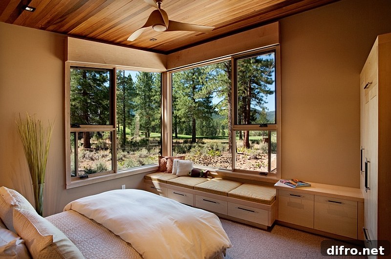 Cozy daybed in the corner next to the stylish corner window of the bedroom
