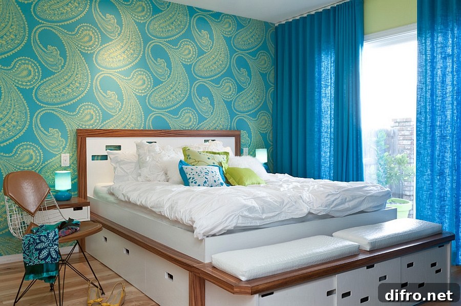 Bold and colorful wallpaper and drapes shape the gorgeous bedroom