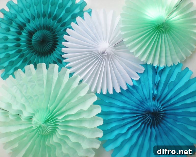 Paper fans from Etsy shop Della Carta Decor