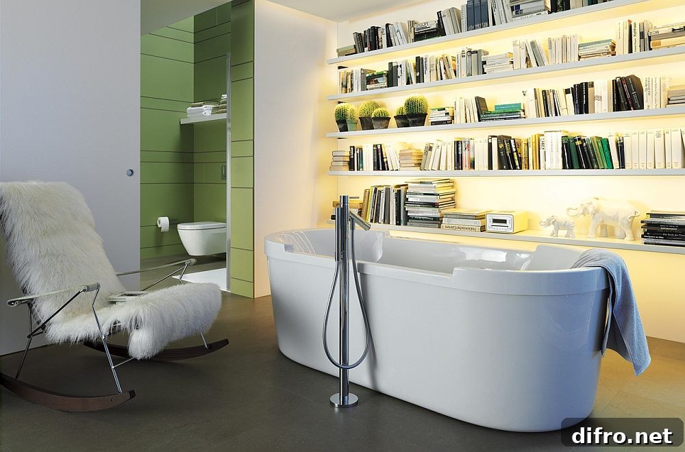 Bathroom with standalone tub and a sleek bookshelf [Design: Duravit]