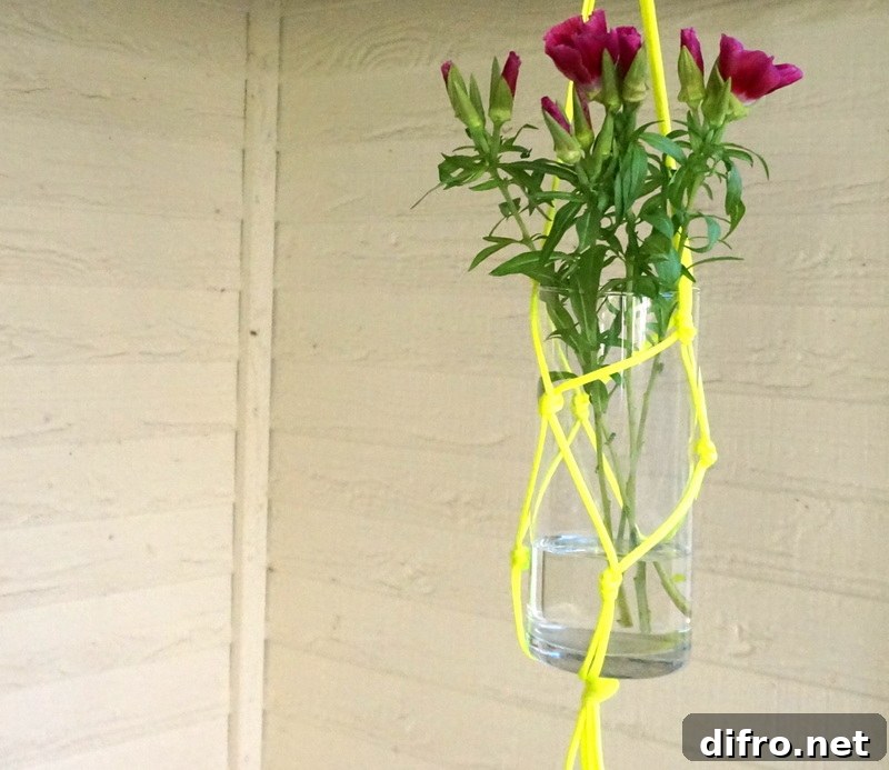 DIY hanging vase with purple flowers