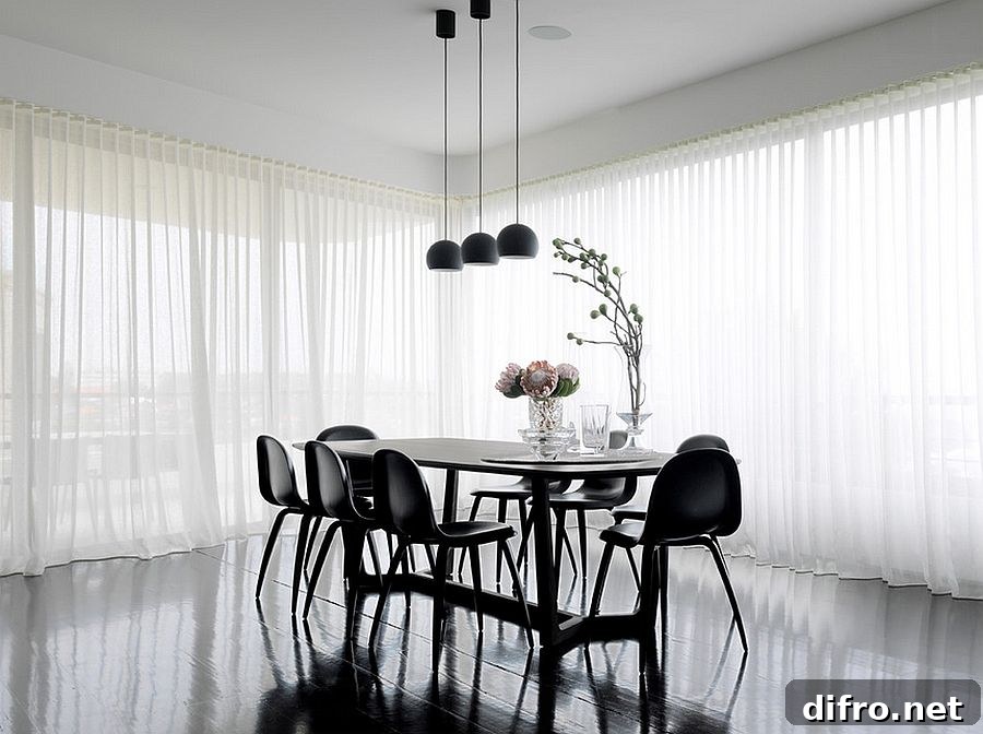 Fascinating dining room design dips into the beauty of black [Design: Luigi Rosselli Architects]