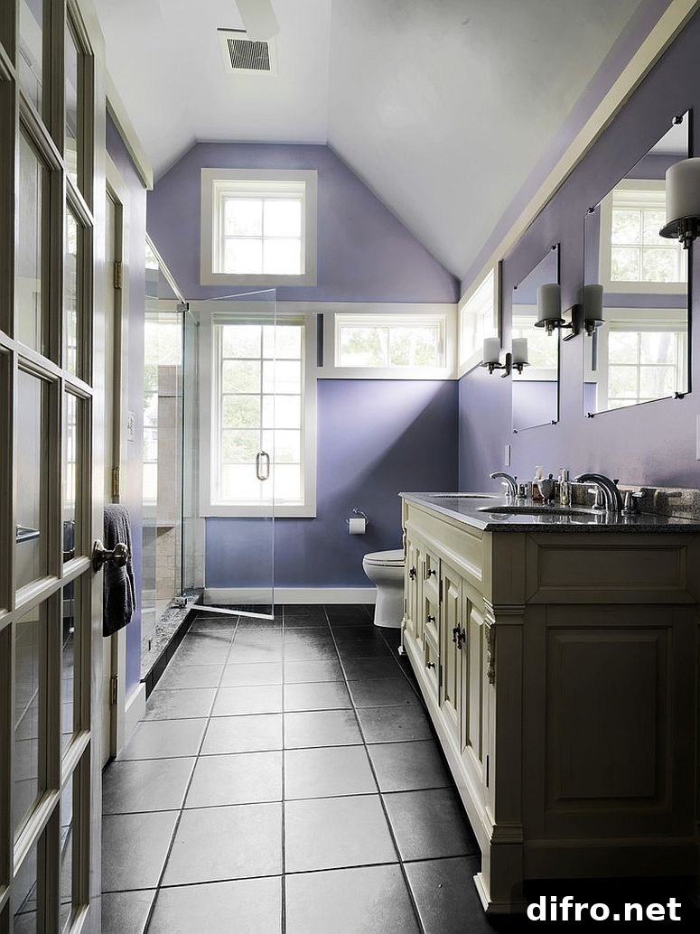 Purple helps paint a soothing backdrop in the stylish bathroom [Design: Design Dynamics / Susan Teare Photography]
