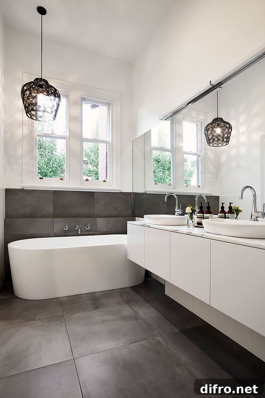 Fabulous bathroom design with pendant lighting and standalone bathtub