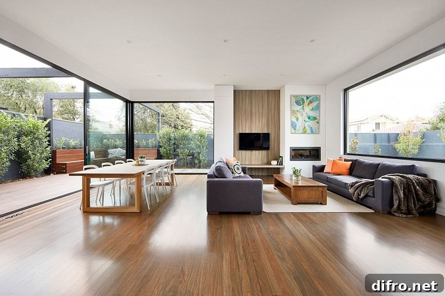 Contemporary living zone opens up visually to the backyard