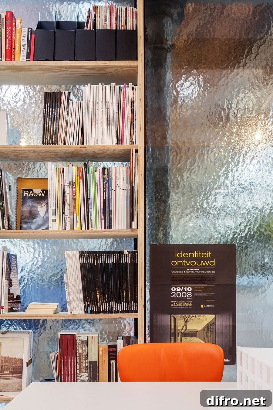 Large bookshelf in the home office with a frosted glass backdrop