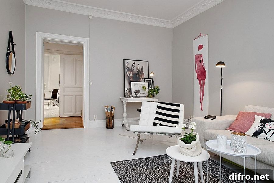 Throw pillows and wall art add a touch of feminity to the room