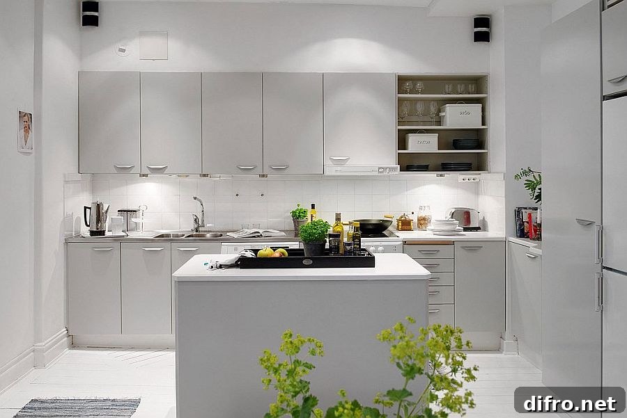 White subway tiles create a cool backsplash in the kitchen