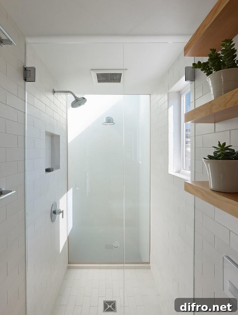 Sparkling white shower with glass doors