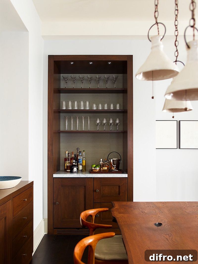 Add a small bar setting to the formal dining room corner [Design: Damon Liss Design]