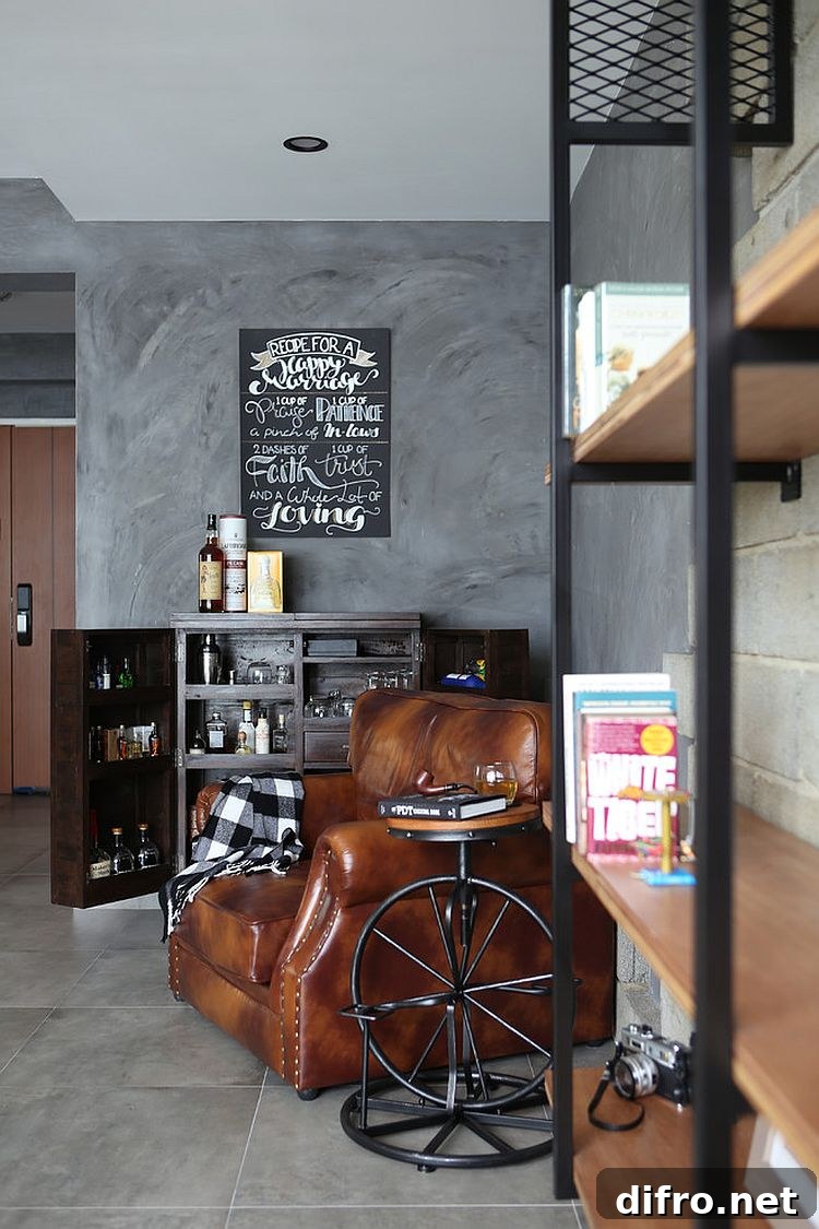 Awesome man cave with a mini bar and plush seating [Design: Versaform]