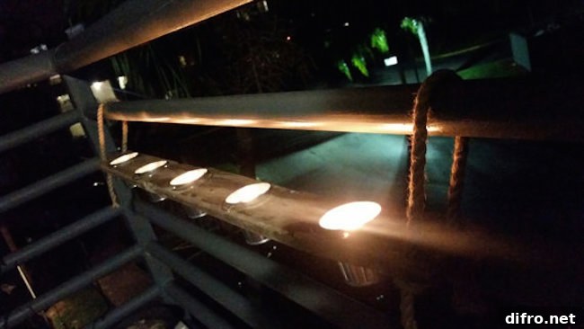 Light up your balcony at night with candles